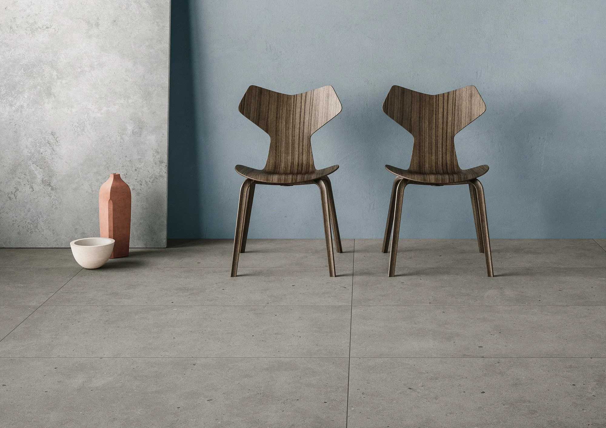 Concrete look porcelain tile floor providing a seamless modern aesthetic.