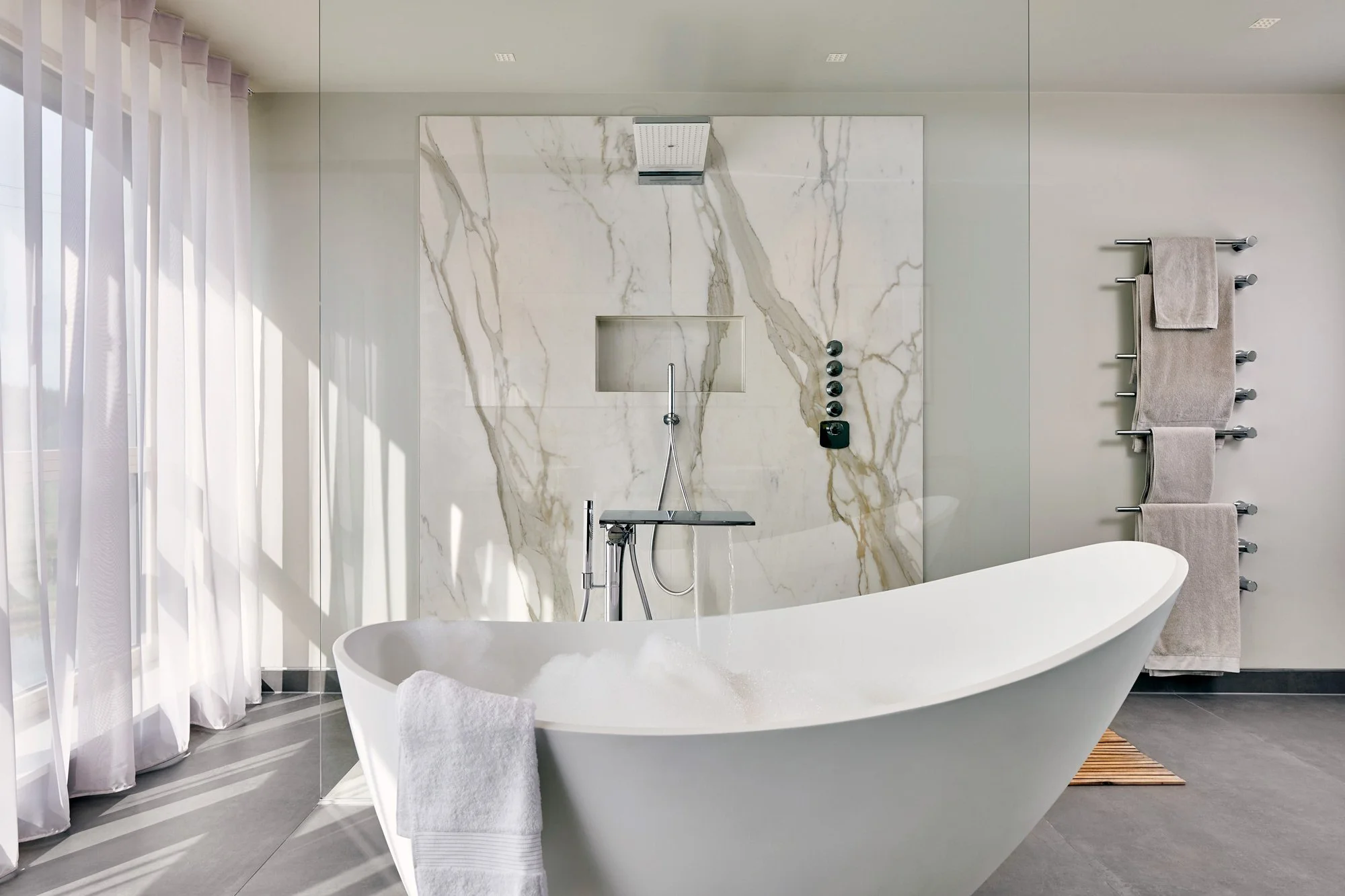 Cement-style porcelain tile with soft texture and natural tonal variation.