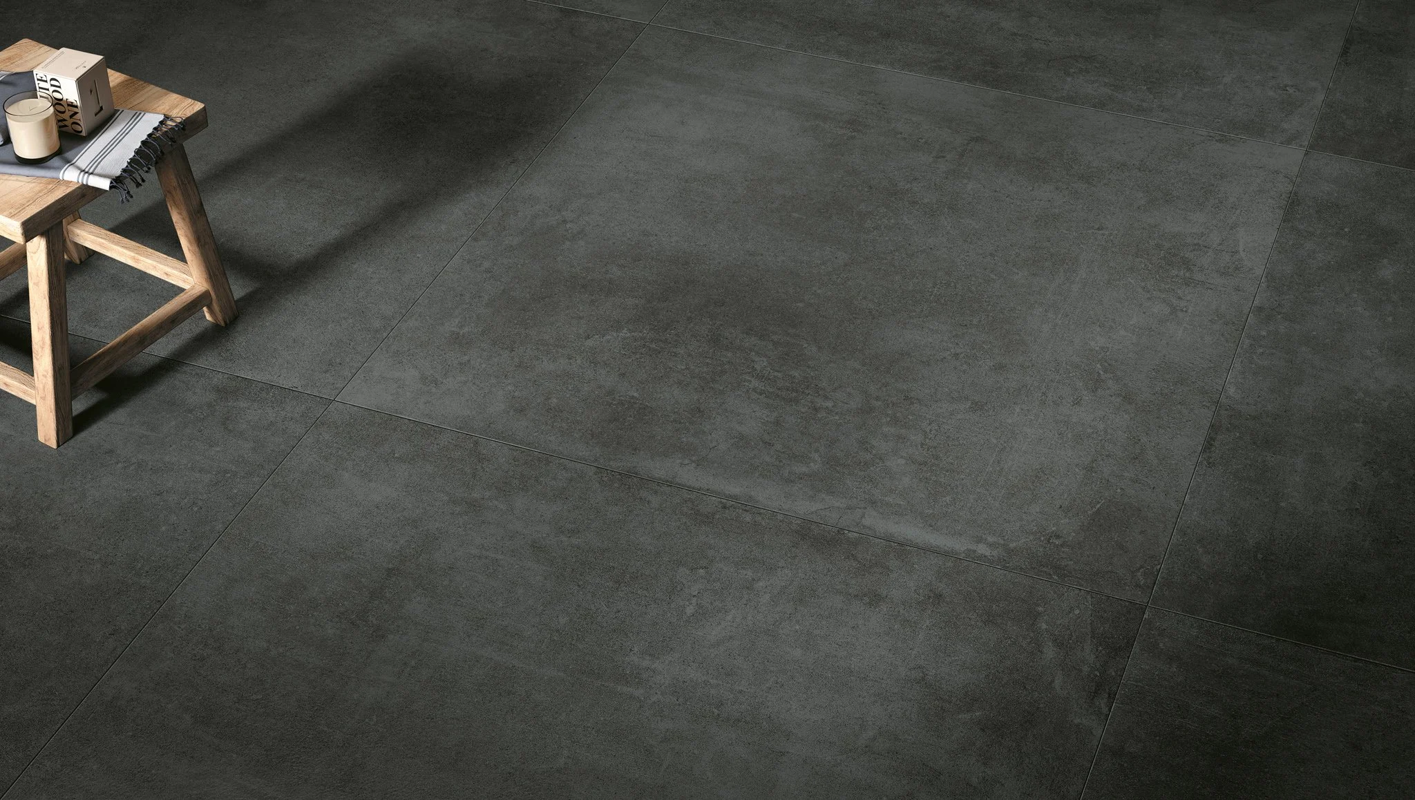 Concrete look porcelain tile flooring displayed in a modern Toronto home by Sapphirus Stone & Tile.