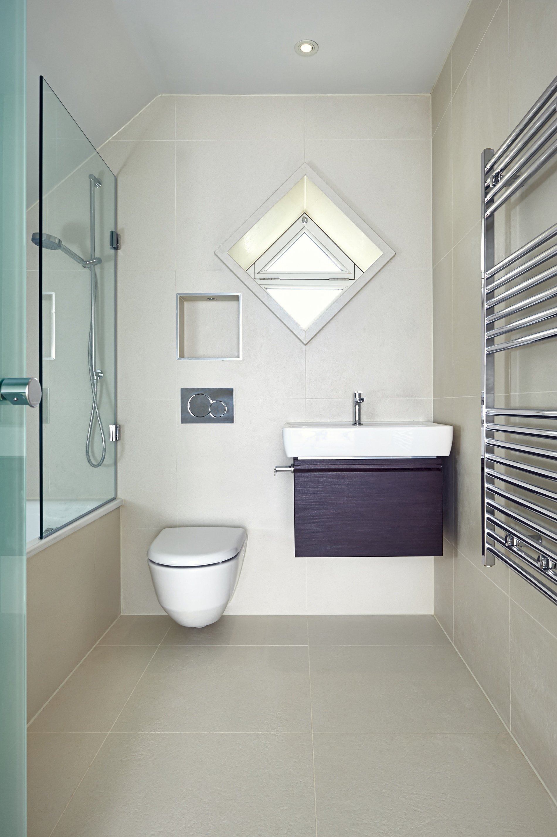 Concrete look porcelain tile providing a seamless contemporary finish.