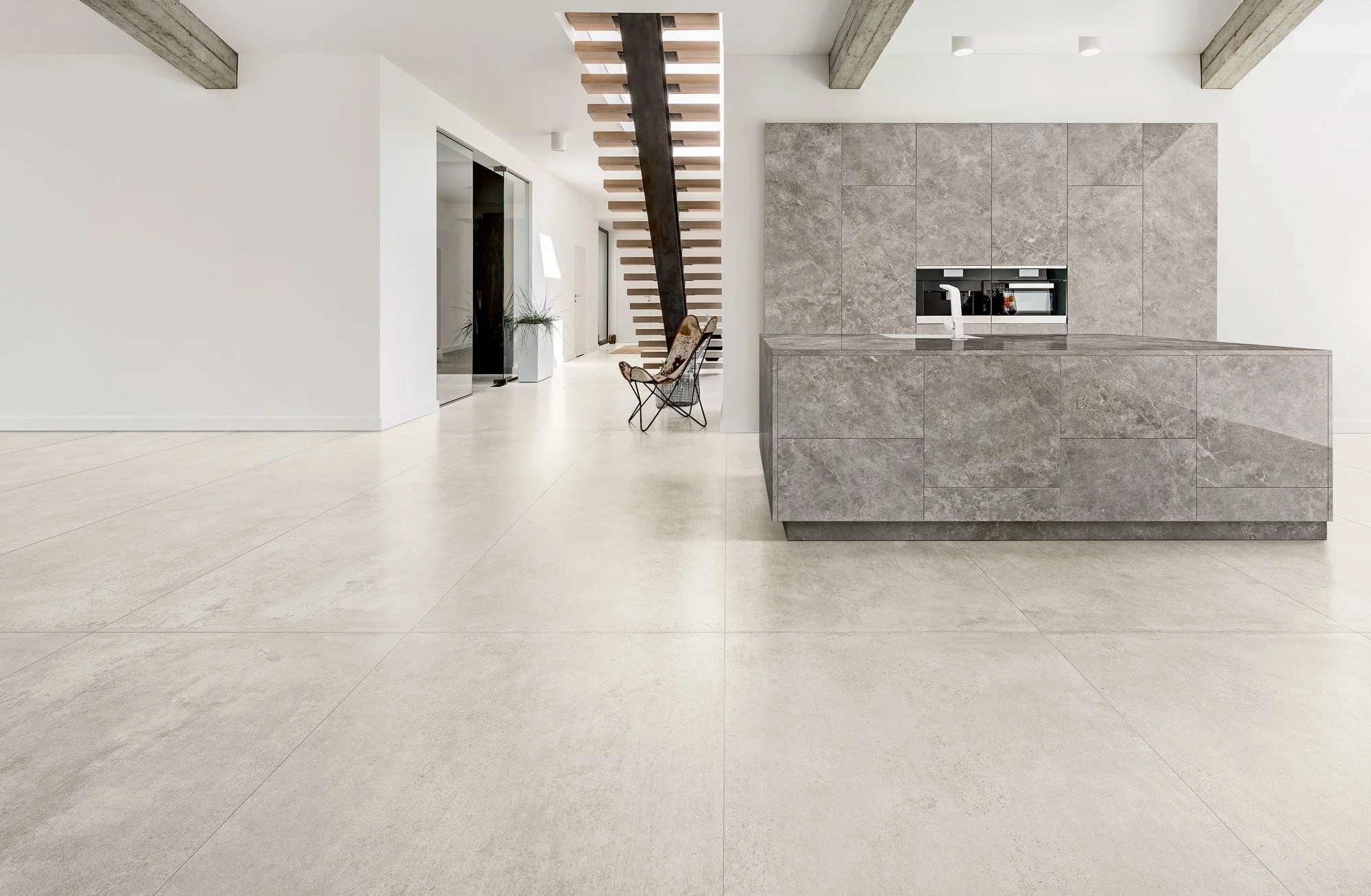 Modern concrete look tile flooring with durable porcelain construction.