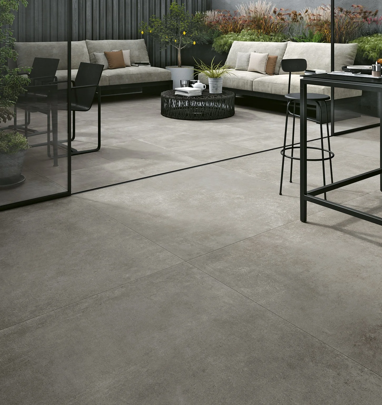 Concrete look porcelain tile with realistic cement-inspired detailing.