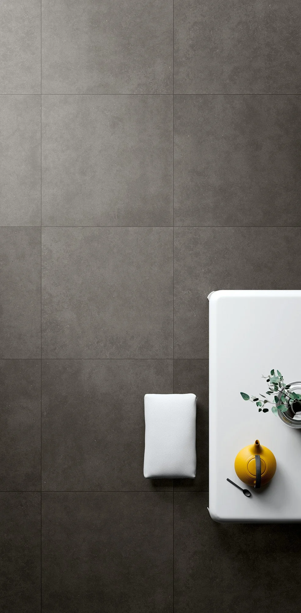 Modern open-concept space finished with concrete look porcelain tiles.