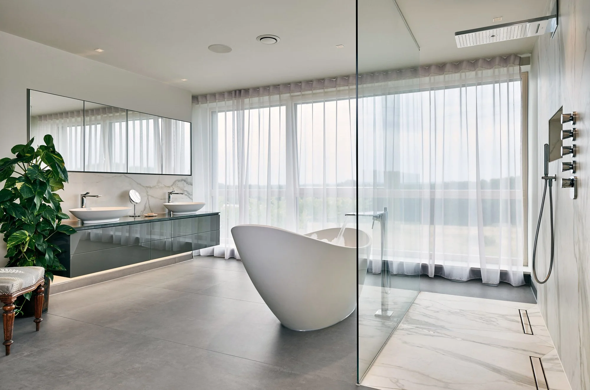 Matte concrete look porcelain tile creating a calm and modern atmosphere.