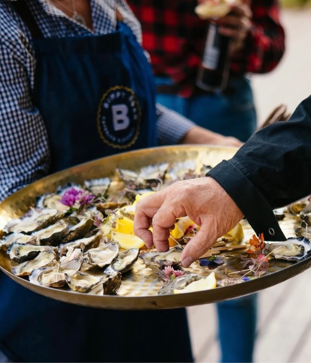 Freshly shucked oysters with lemon cheeks