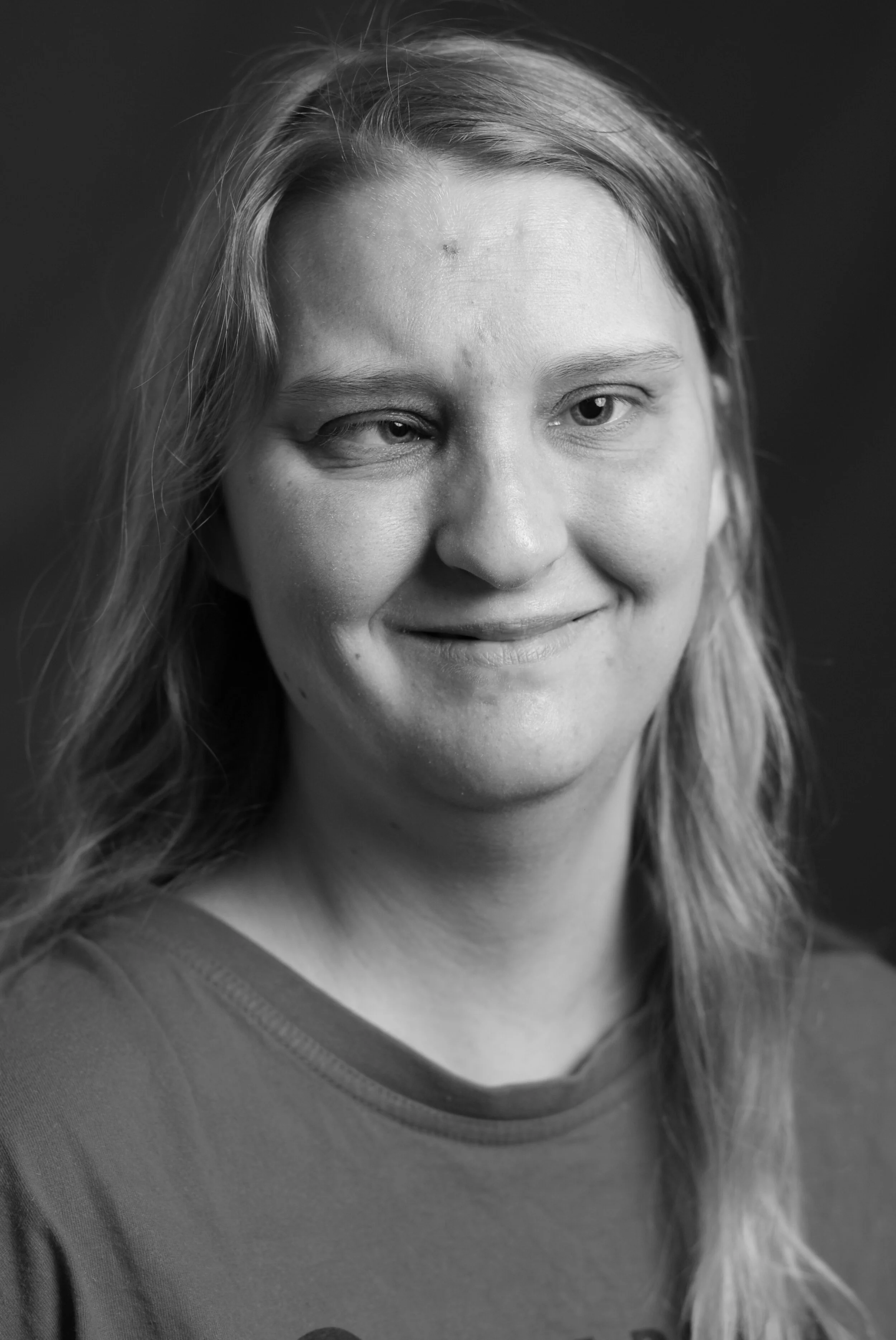 Black and white photos of Sara, she has long blonde hair.