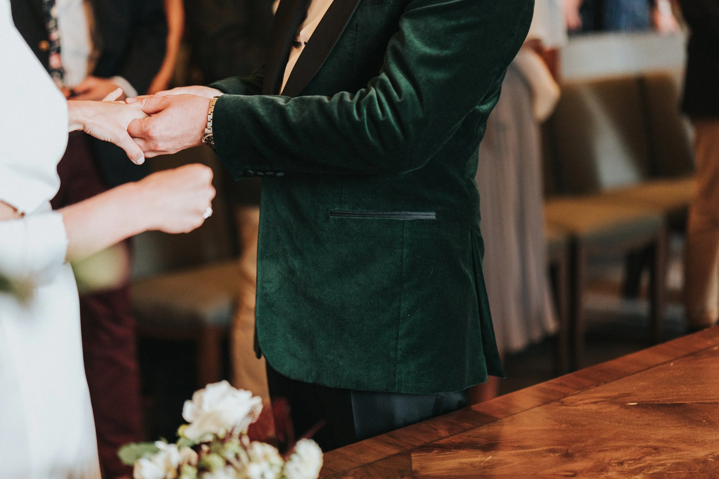 Groom putting the ring on the Bride's hand at a Old Marylebone Town Hall Wedding