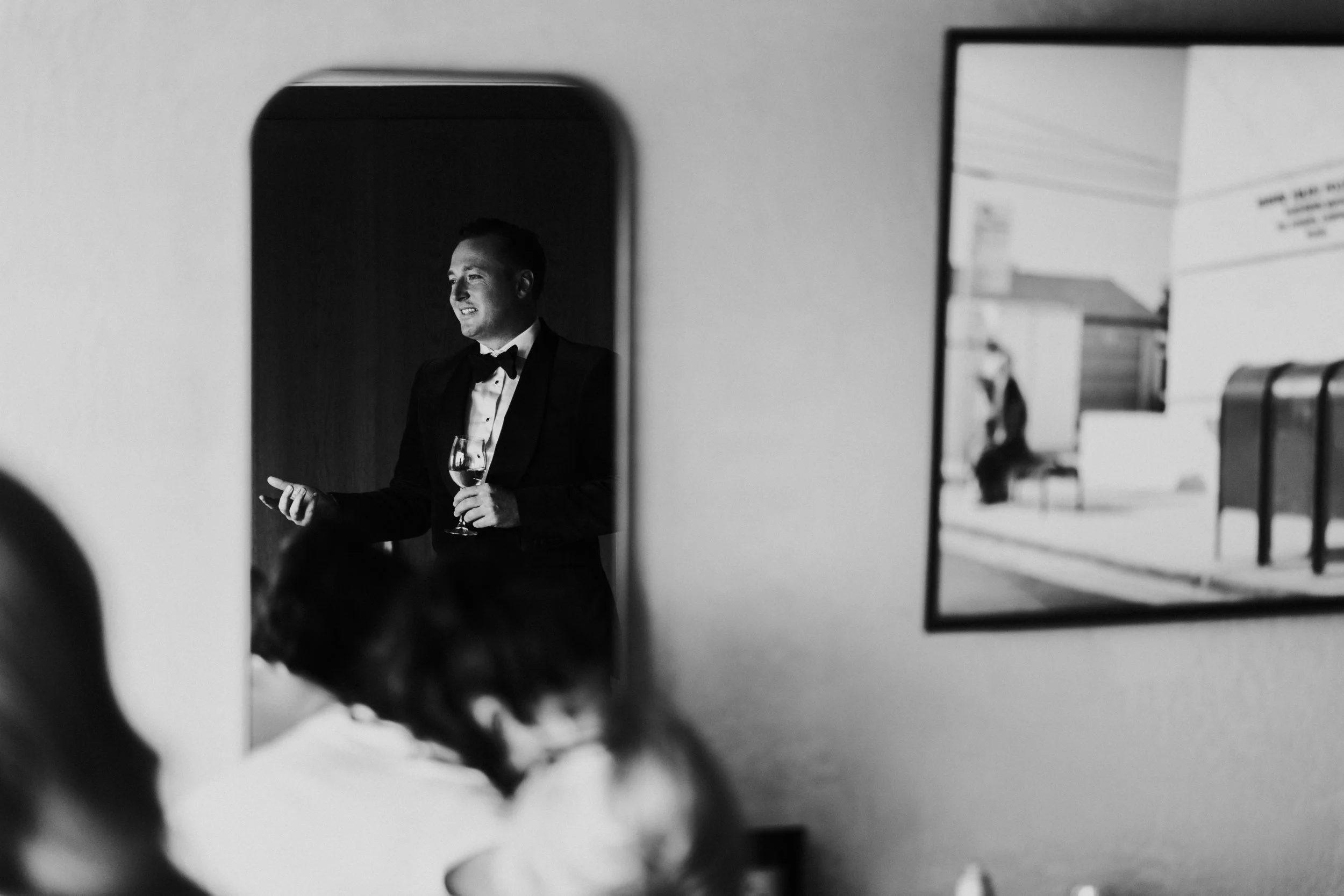 Reflection of Groom in the mirror at The Treehouse, London at a Old Marylebone Town Hall Wedding