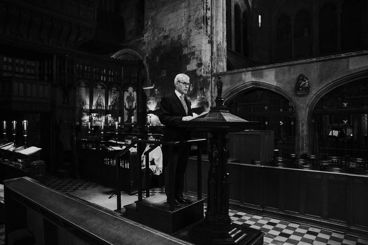 Guest at a Pulpit in St Bartholomew the Great church, Smithfield giving a speech to a City of London Wedding.