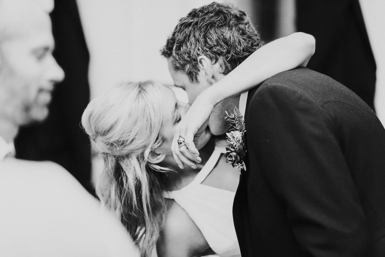 Wedding couple kissing passionately at St John Restaurant, Smithfield at a City of London Wedding.