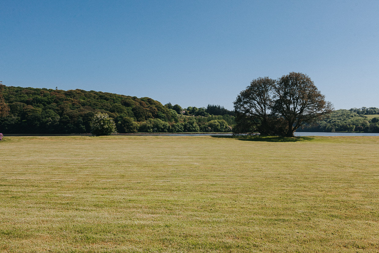 Scenic view of the grounds and the lake on the Ballynatray Estate for a Cork Wedding