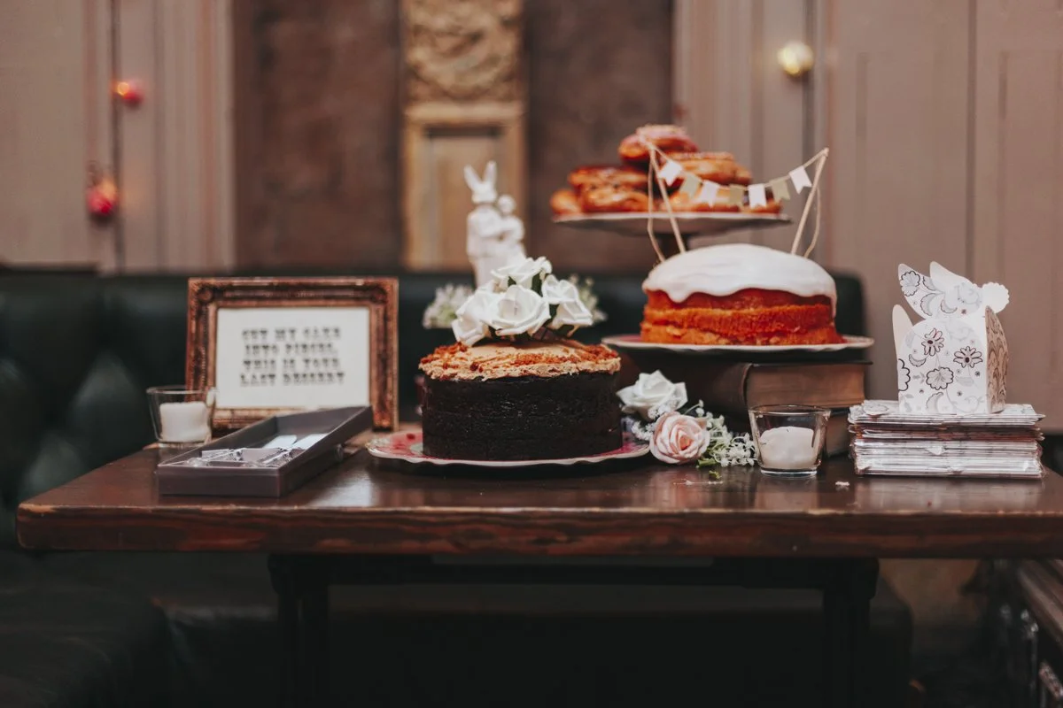 Wedding dessert table set up for the Wedding reception at the iconic The Old Queens Head, Essex Road, Islington for a London Wedding