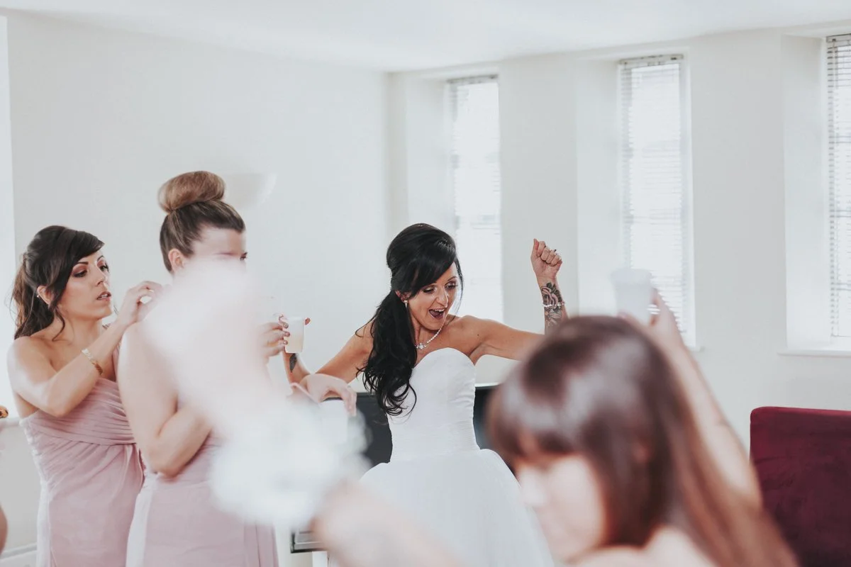 Bride & Bridesmaids dancing at Morning Prep before the Wedding at Islington Town Hall