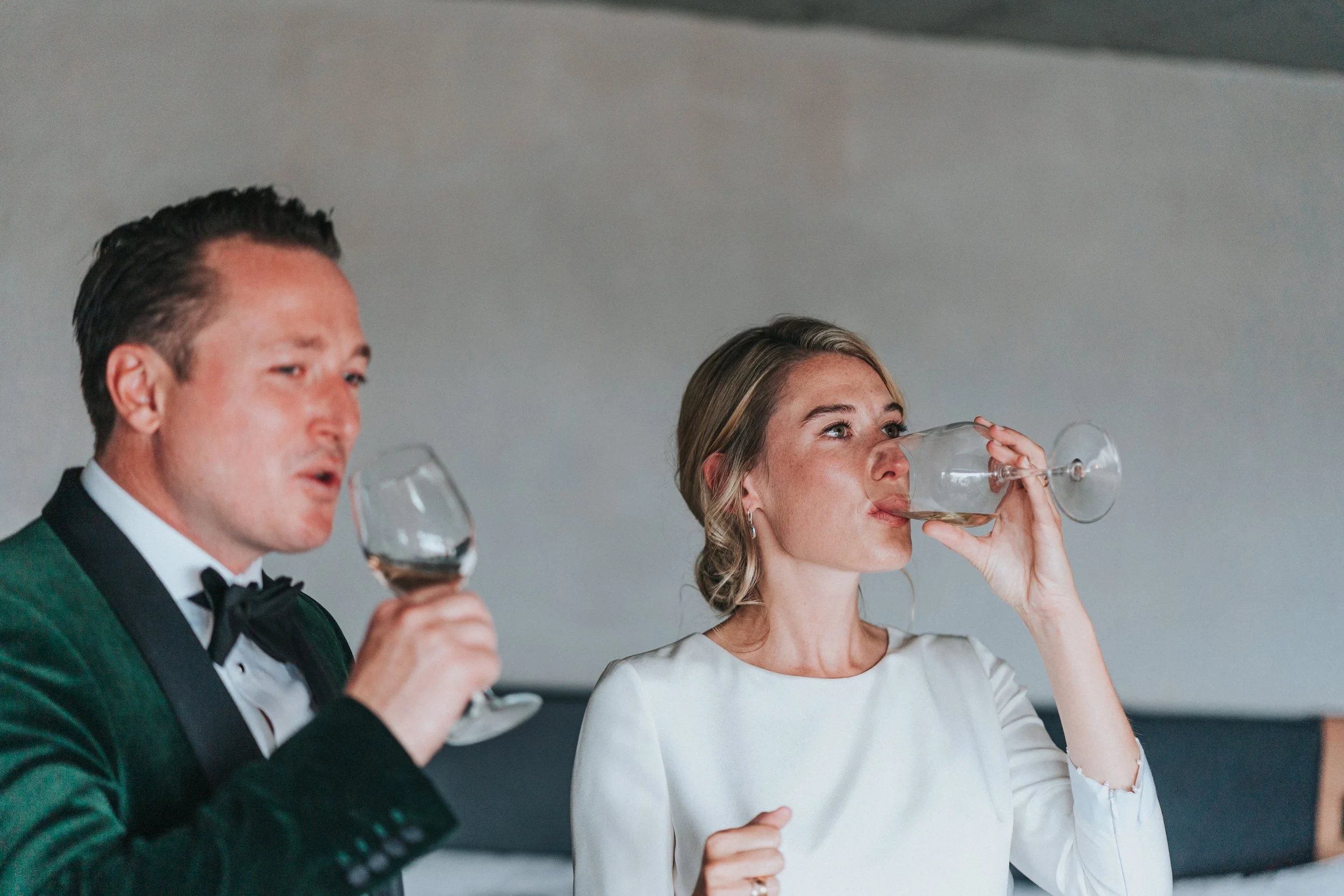 Wedding couple sipping wine at The Treehouse, London at a Old Marylebone Town Hall Wedding
