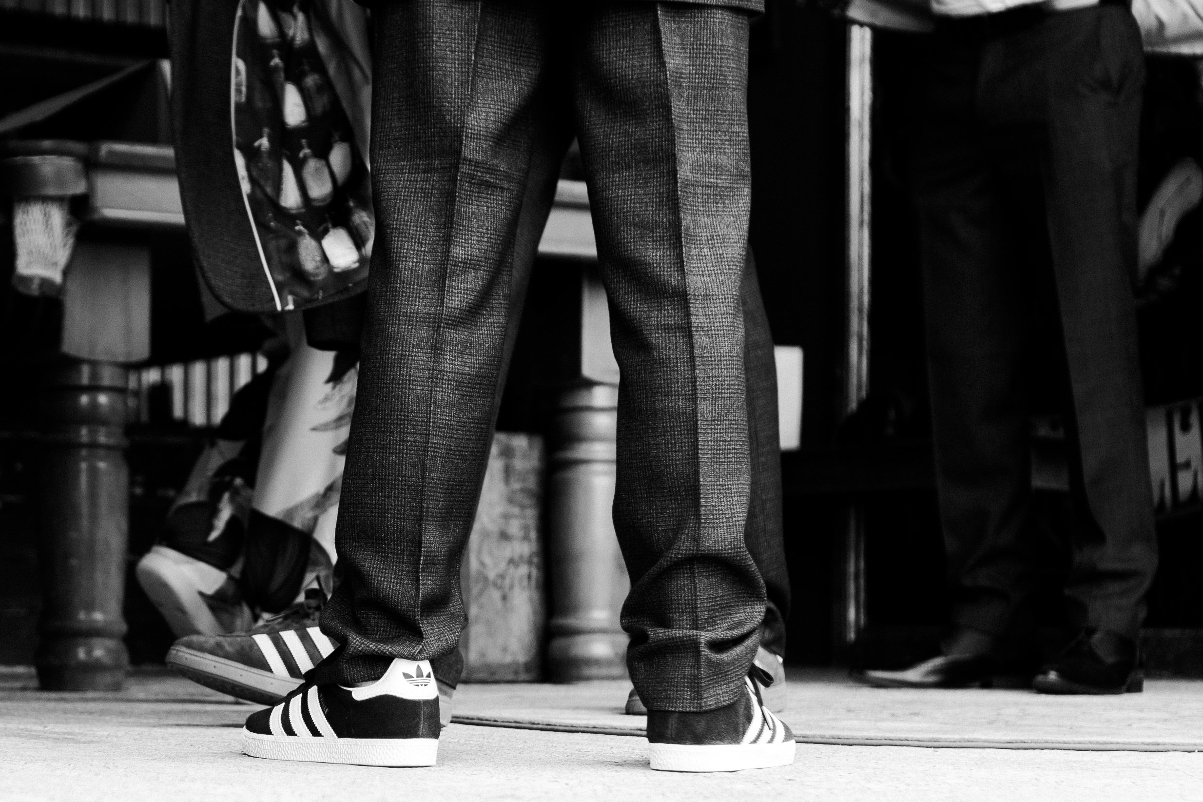 image of the Groom trainers in the old turkey barn at a rhyse farm wedding