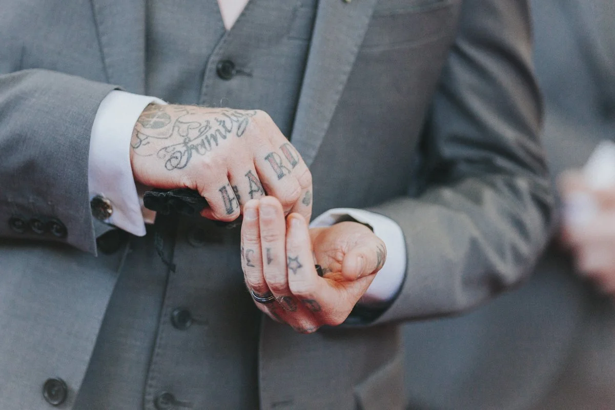 Groomsmen playing the wedding ring at Islington Town Hall Wedding Venue