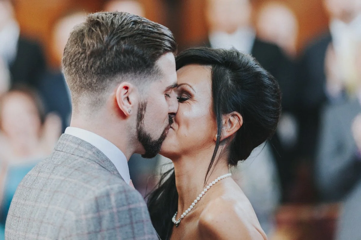 Bride & Groom kissing inside The Council Chambers at Islington Town Hall Wedding Venue