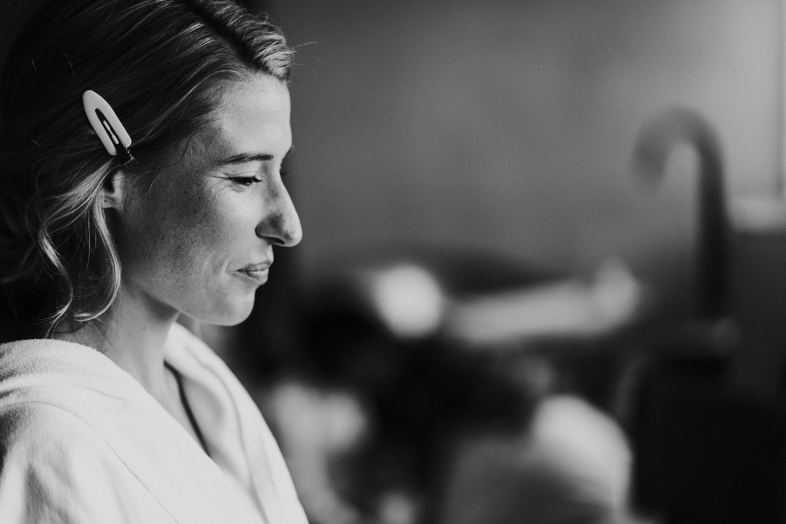 Bride smiling at morning prep at The Treehouse, London before a Old Marylebone Town Hall Wedding Photography