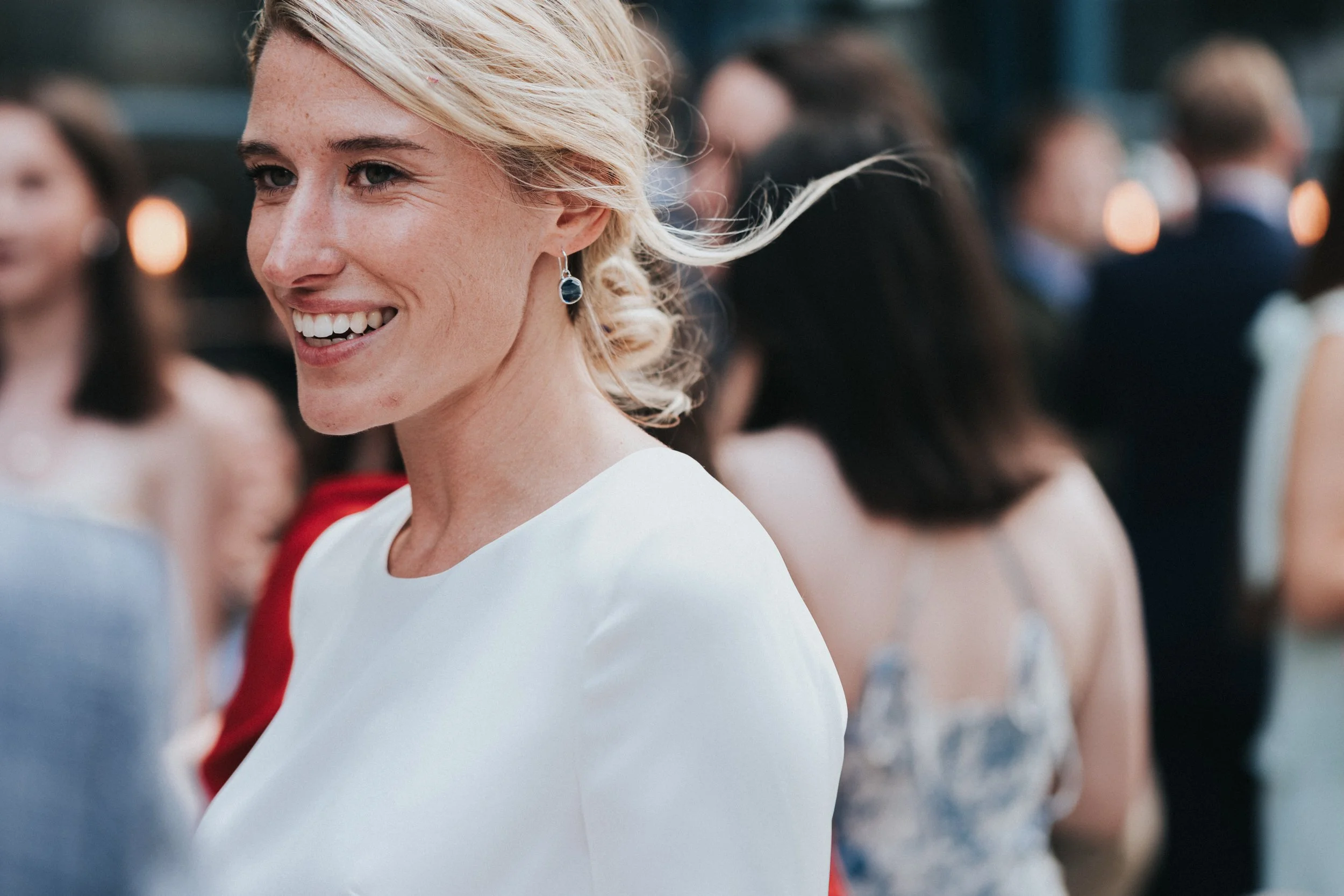 Bride smiling outside the pub at a Old Marylebone Town Hall Wedding