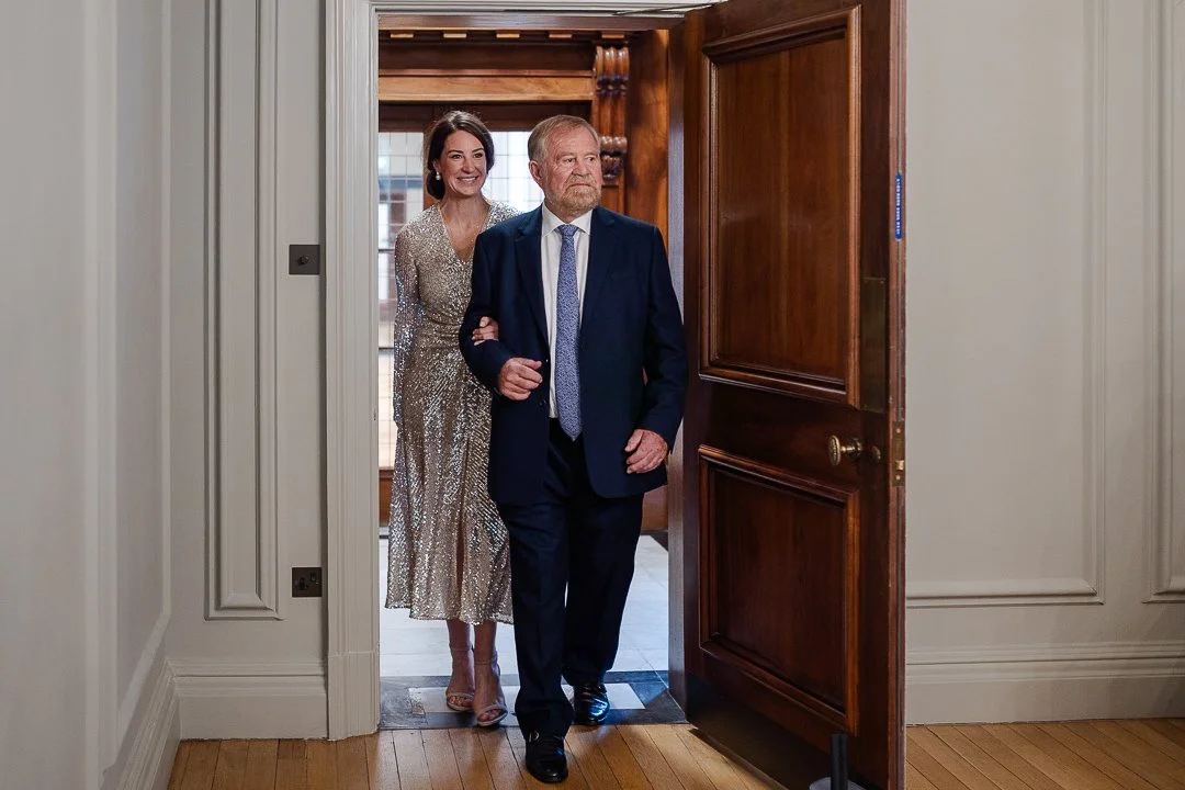 Bride & Father walking into the ceremony room at the Old Marylebone Town Hall Wedding.