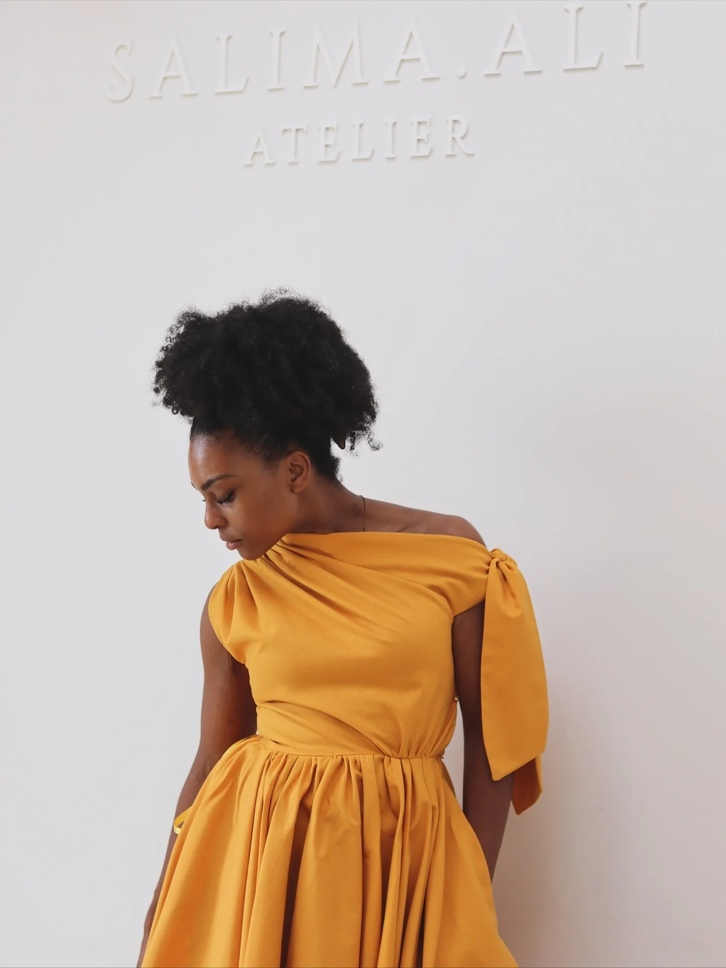 Moments in the making of the Hibiscus Dress, a beautiful addition to your statement wardrobe. It&rsquo;s so easy to fall in love in the process of making this dress.

#salimaali #occasionwear #luxury