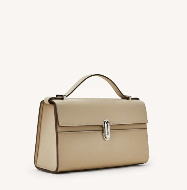 The Symmetry leather top handle bag