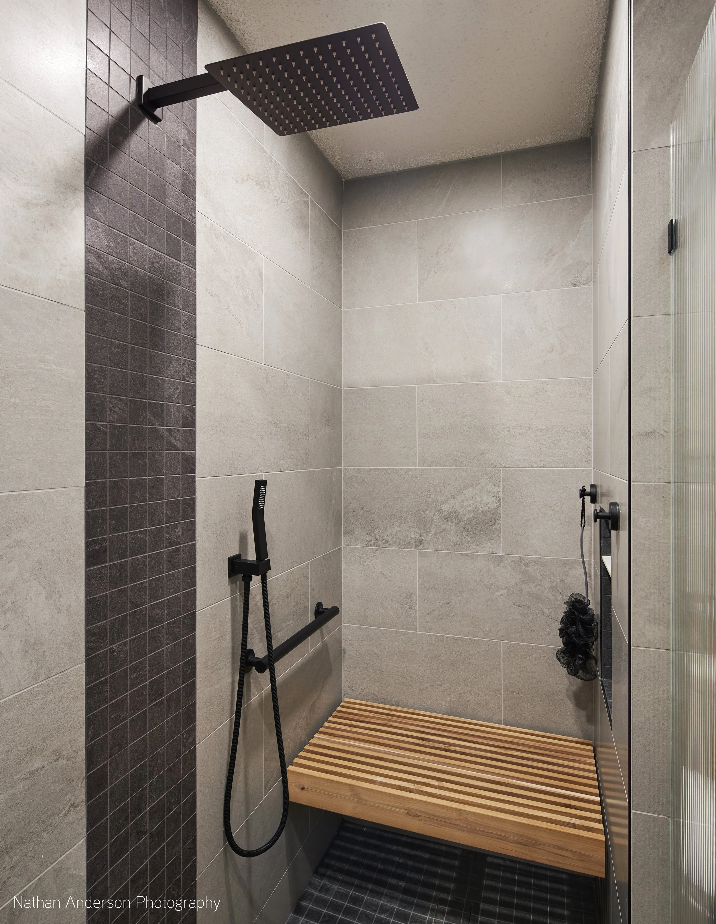 Hand-Crafted Teak shower seat with grab bar for aging-in-place.  Staying in your home for as long as it's safe is a great way to save financially and environmentally.