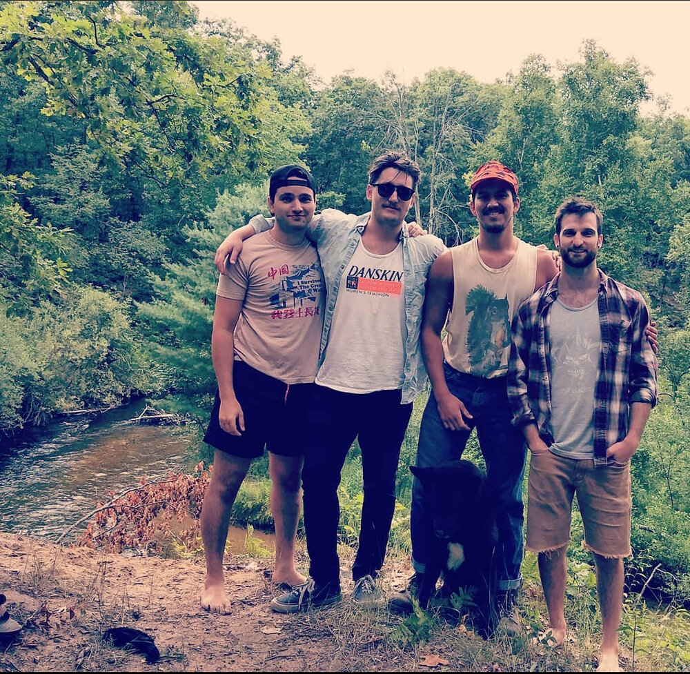 zach with friends on a hike