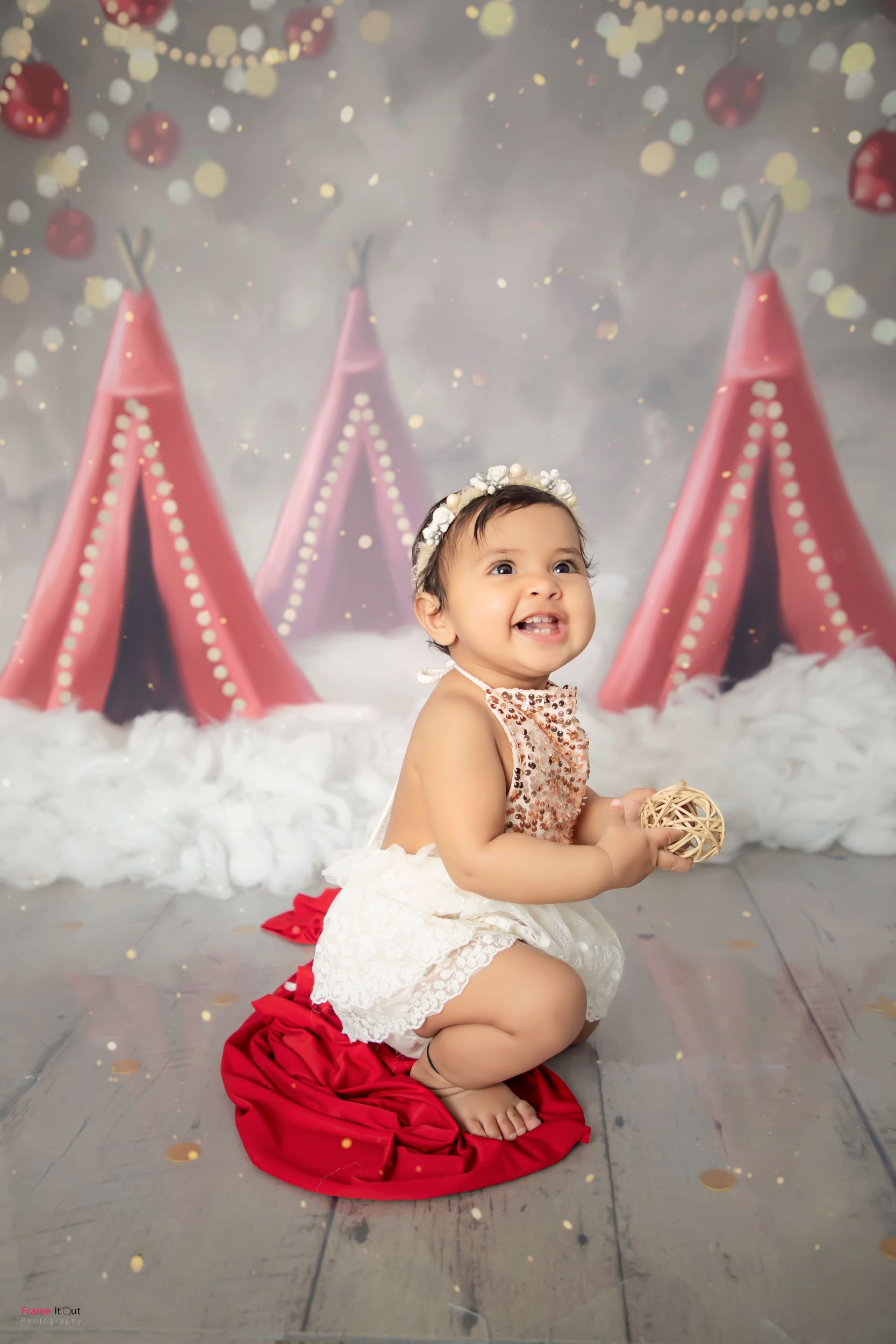 Close-up sitter baby photography showcasing natural smiles in Faridabad studio