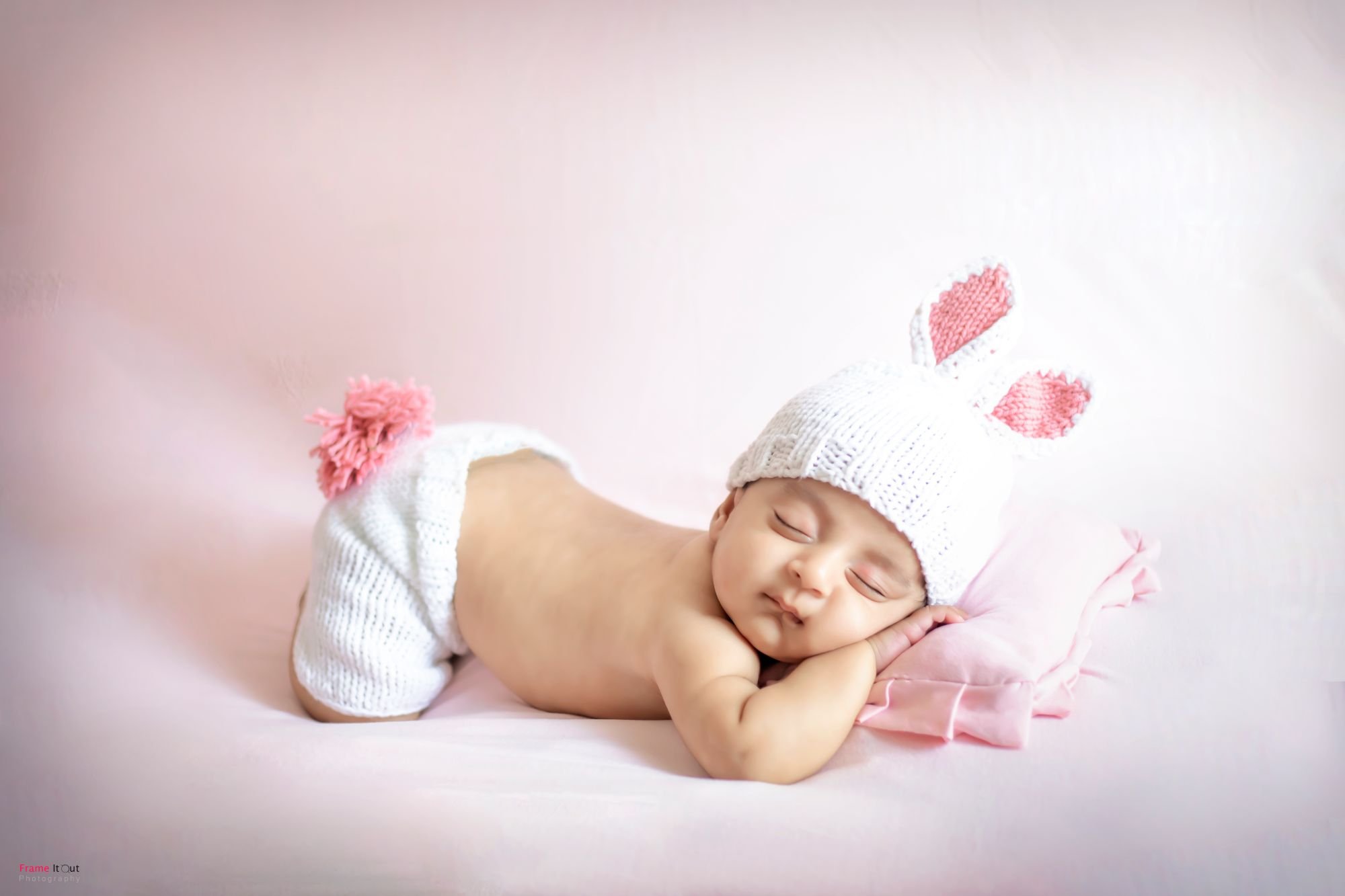 Fine art newborn baby photography focusing on softness and emotion