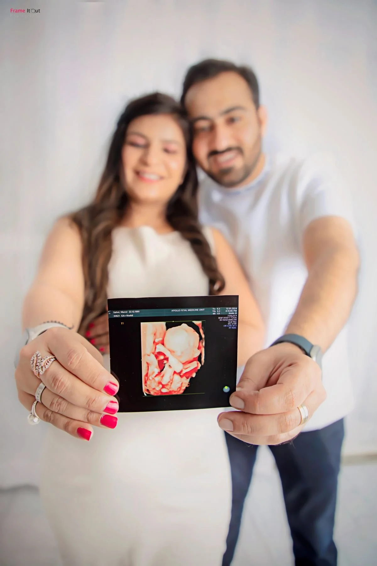 Elegant maternity studio with soft lighting – Frame It Out Photography