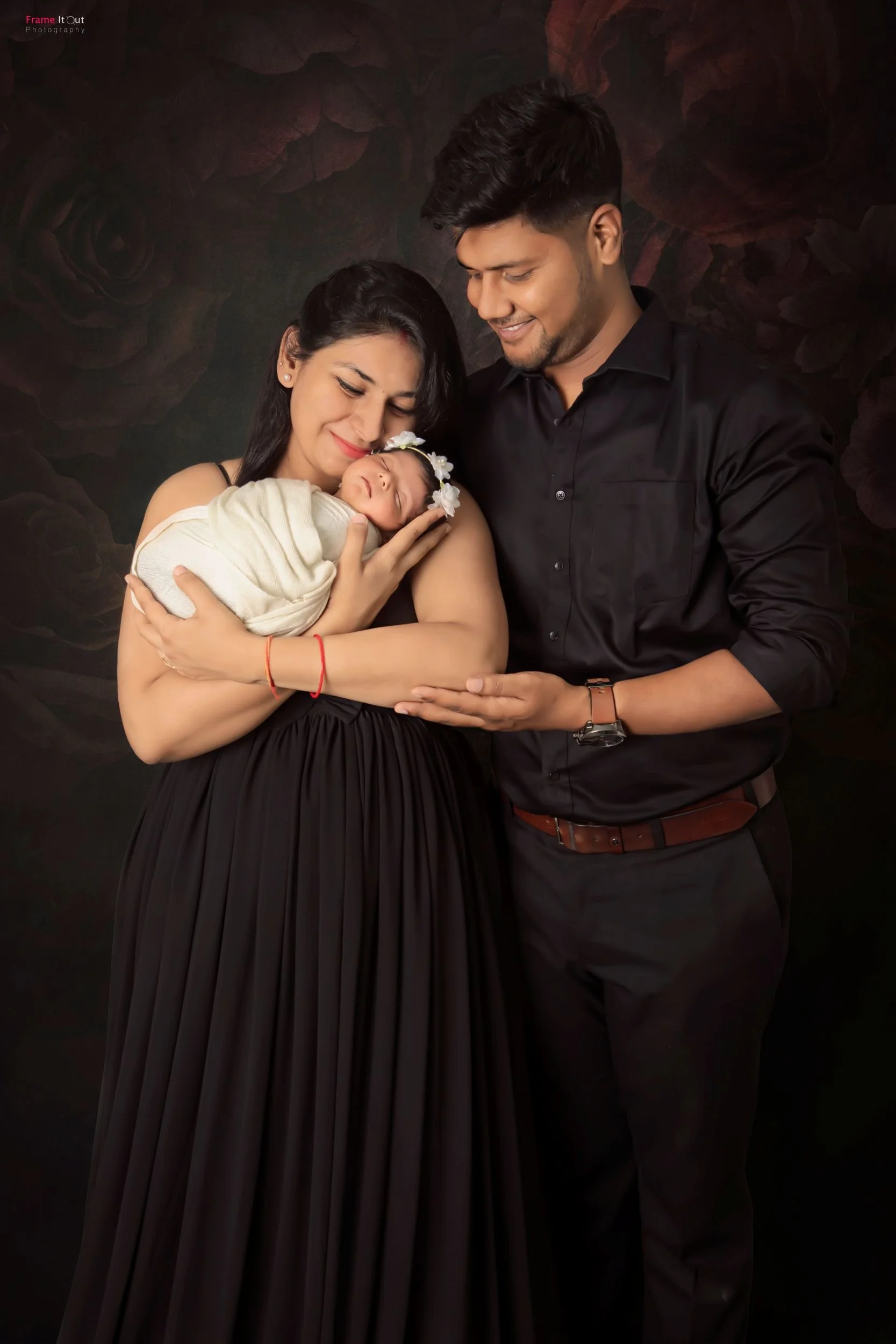 Newborn family portrait with parents in Delhi NCR studio
