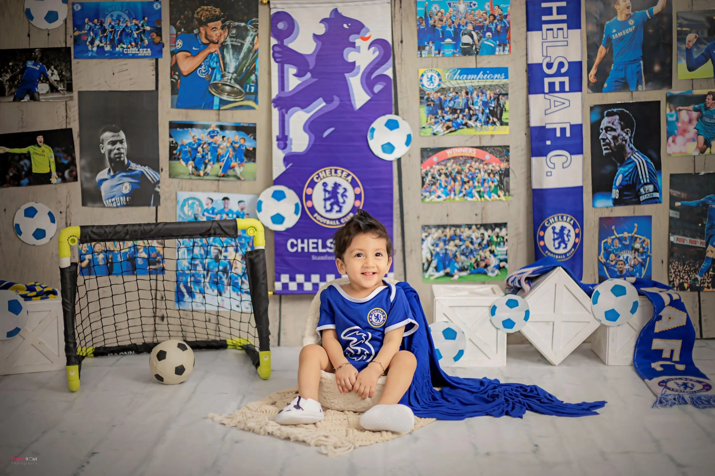 Sitter baby photography showcasing natural expressions at Frame It Out Photography studio in Faridabad, Delhi NCR