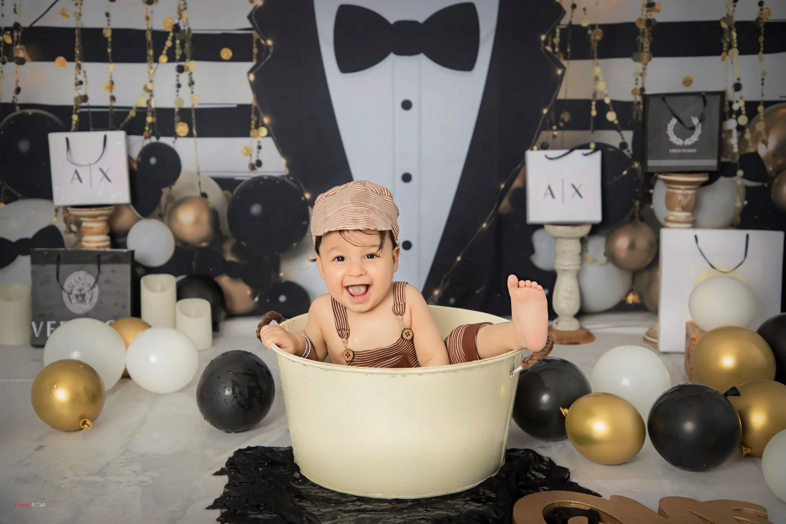 Professional sitter baby portraits created at Frame It Out Photography, Faridabad, capturing memorable first-year milestones