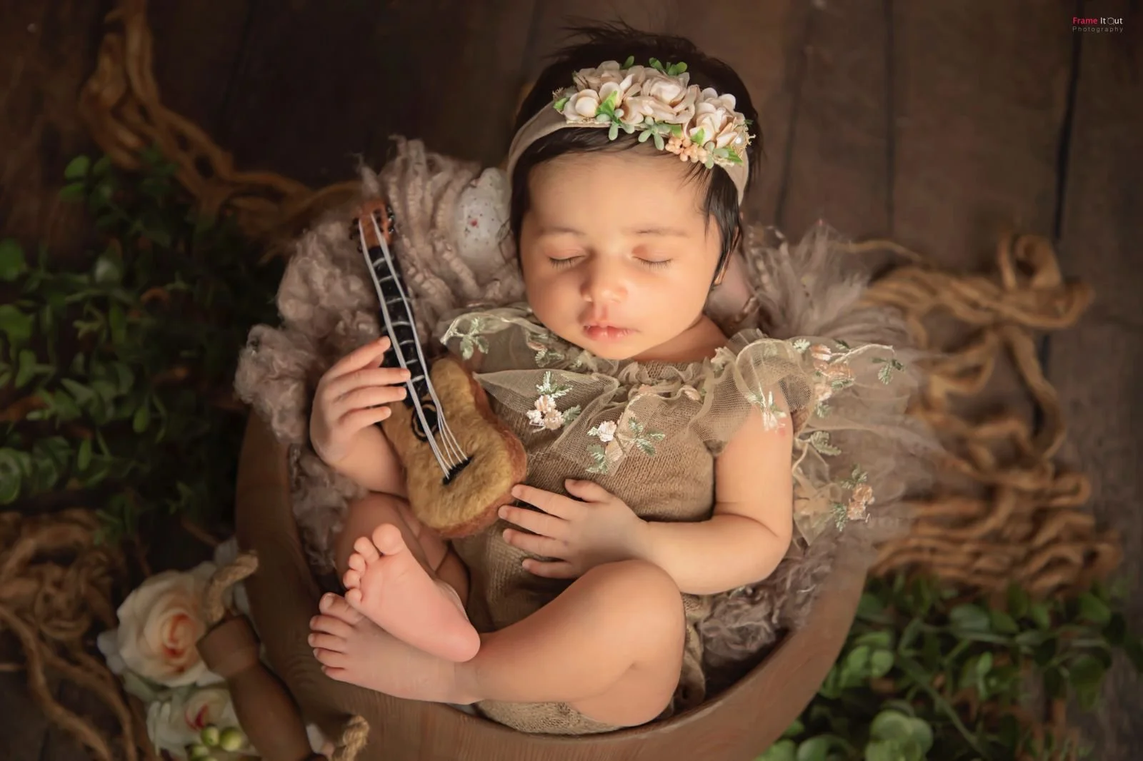 Artistic newborn portrait created during a luxury newborn photography session