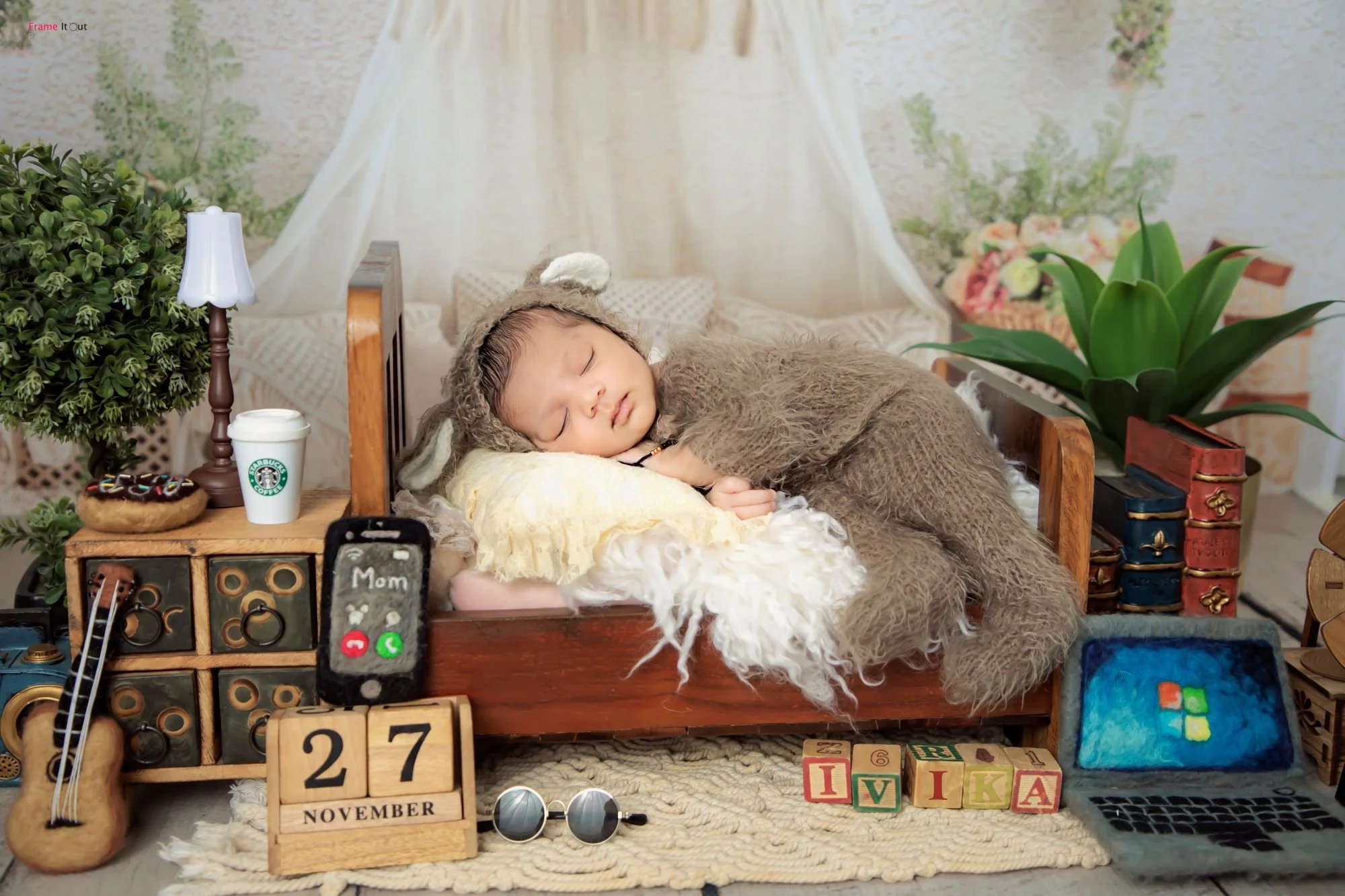 Artistic newborn photography showcasing soft textures and natural tones