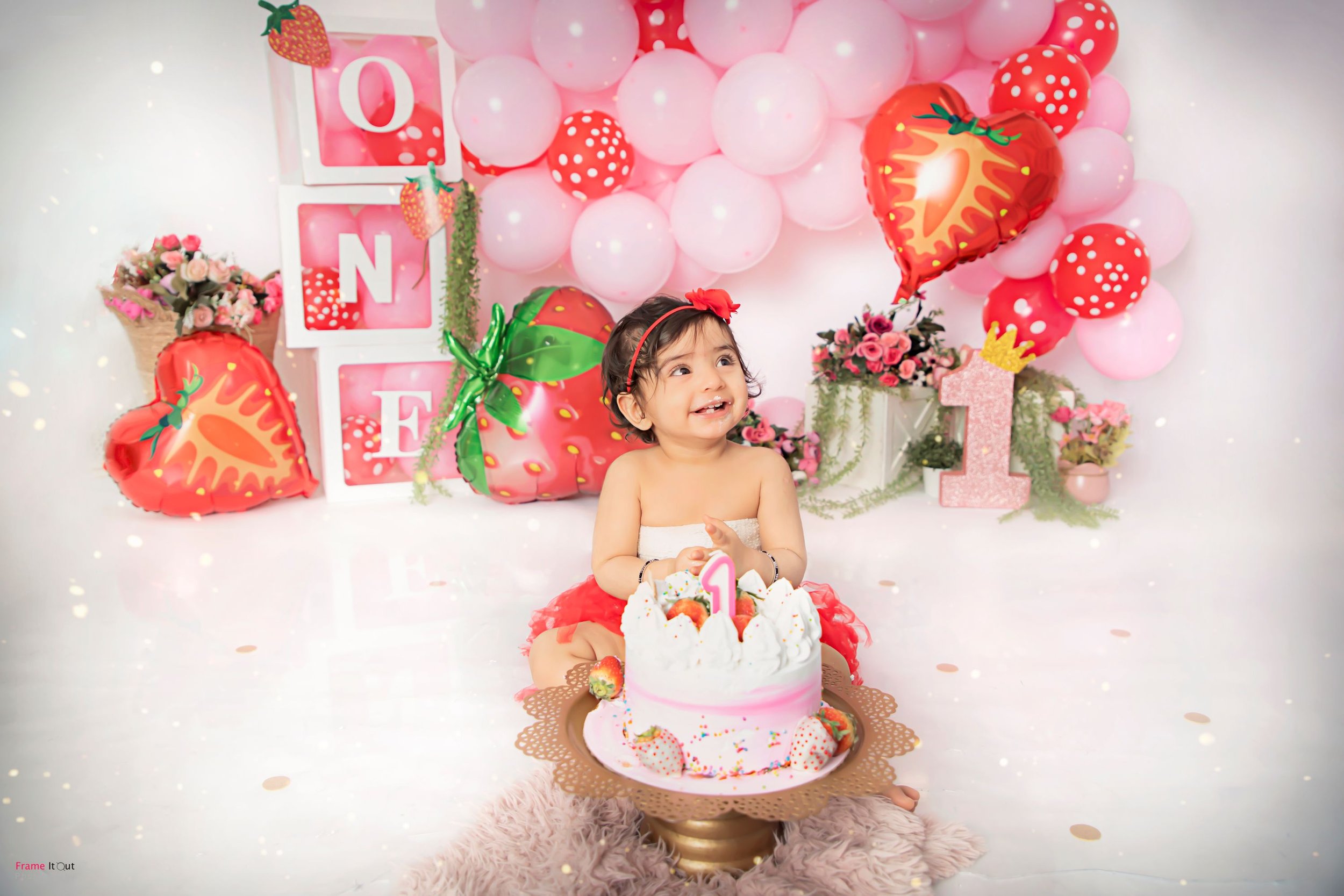 Professionally styled cake smash photography session for babies in Noida