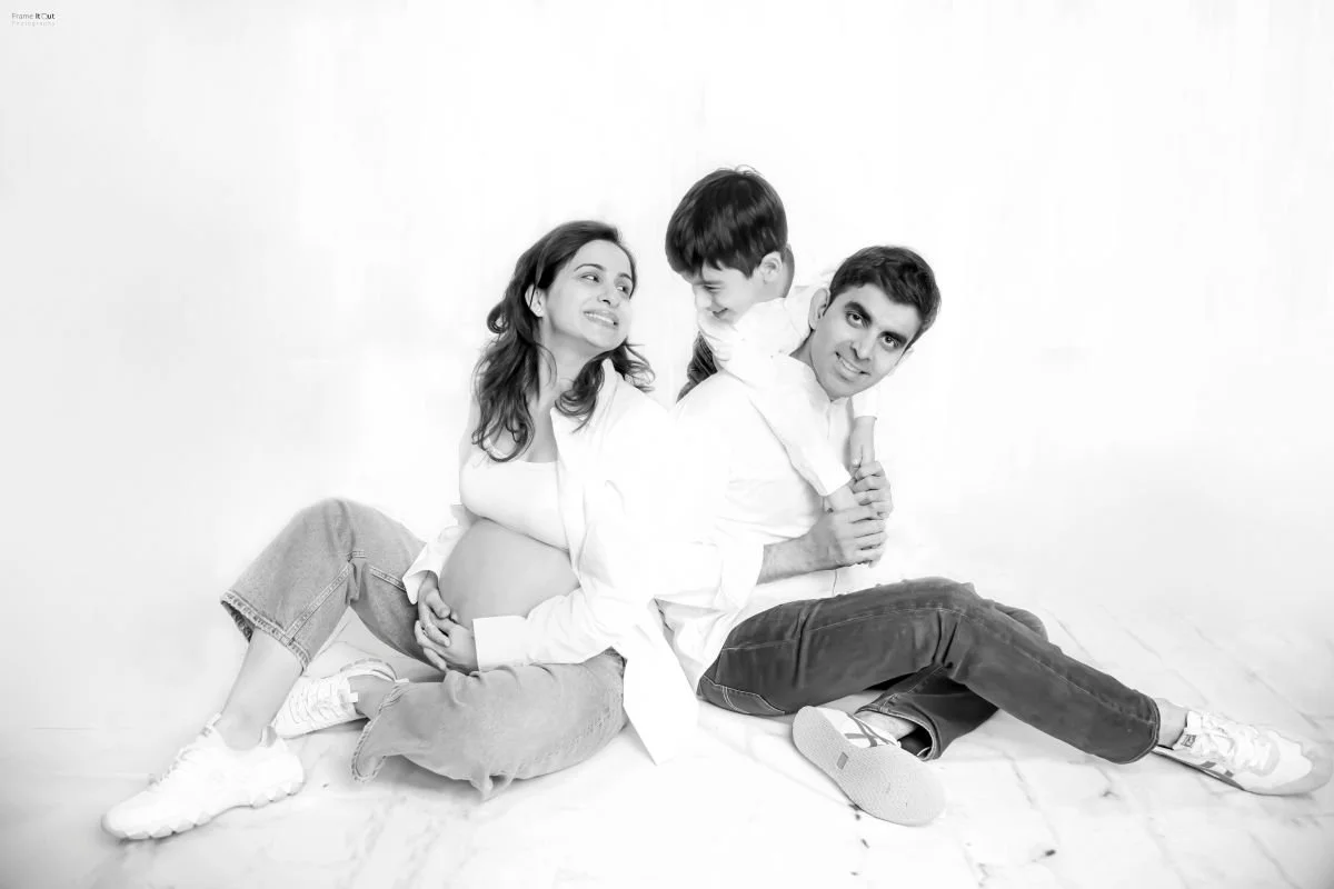 Elegant maternity photoshoot in Noida with soft studio lighting