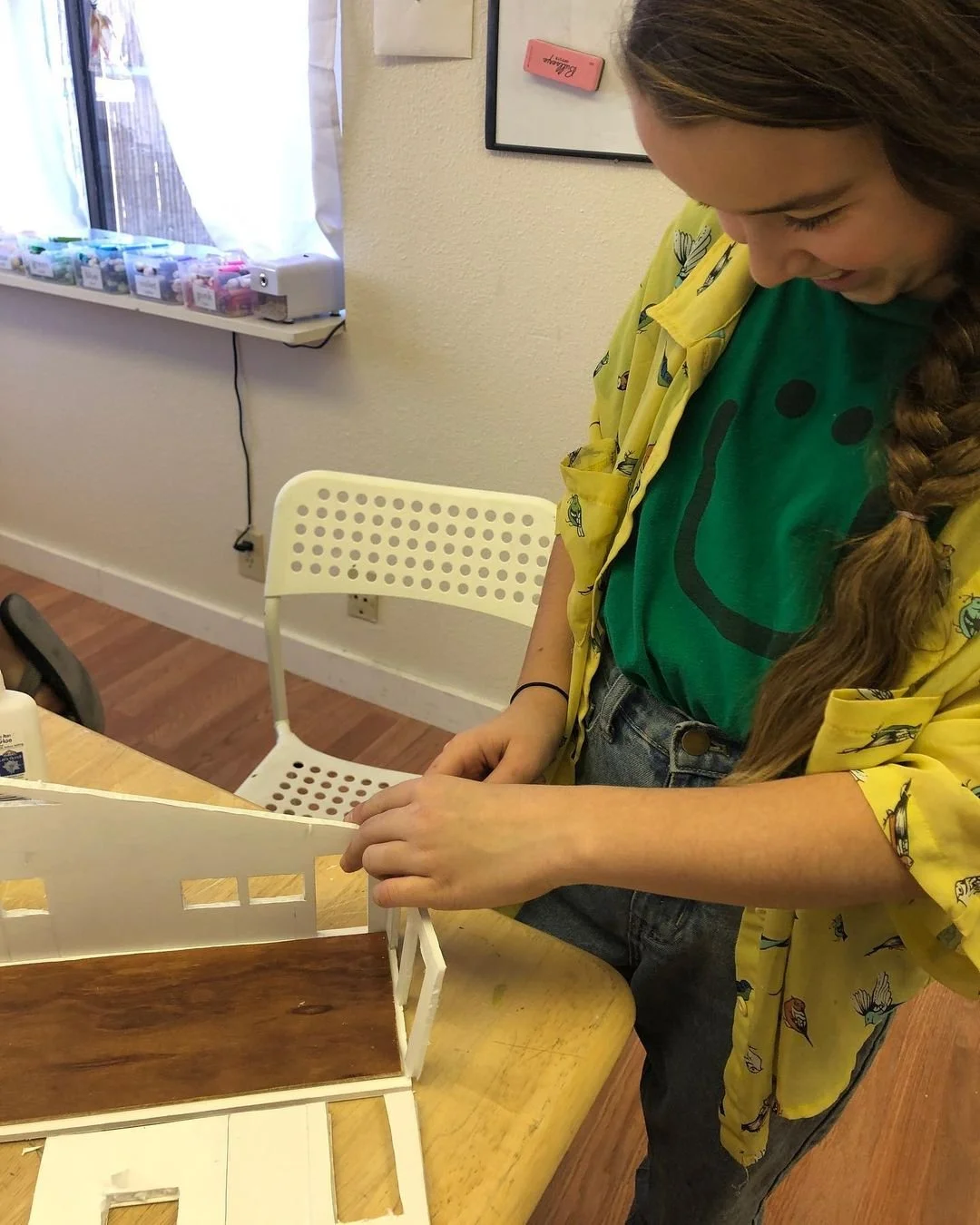 Student in 5th grade working on their Tiny House Challenge model.