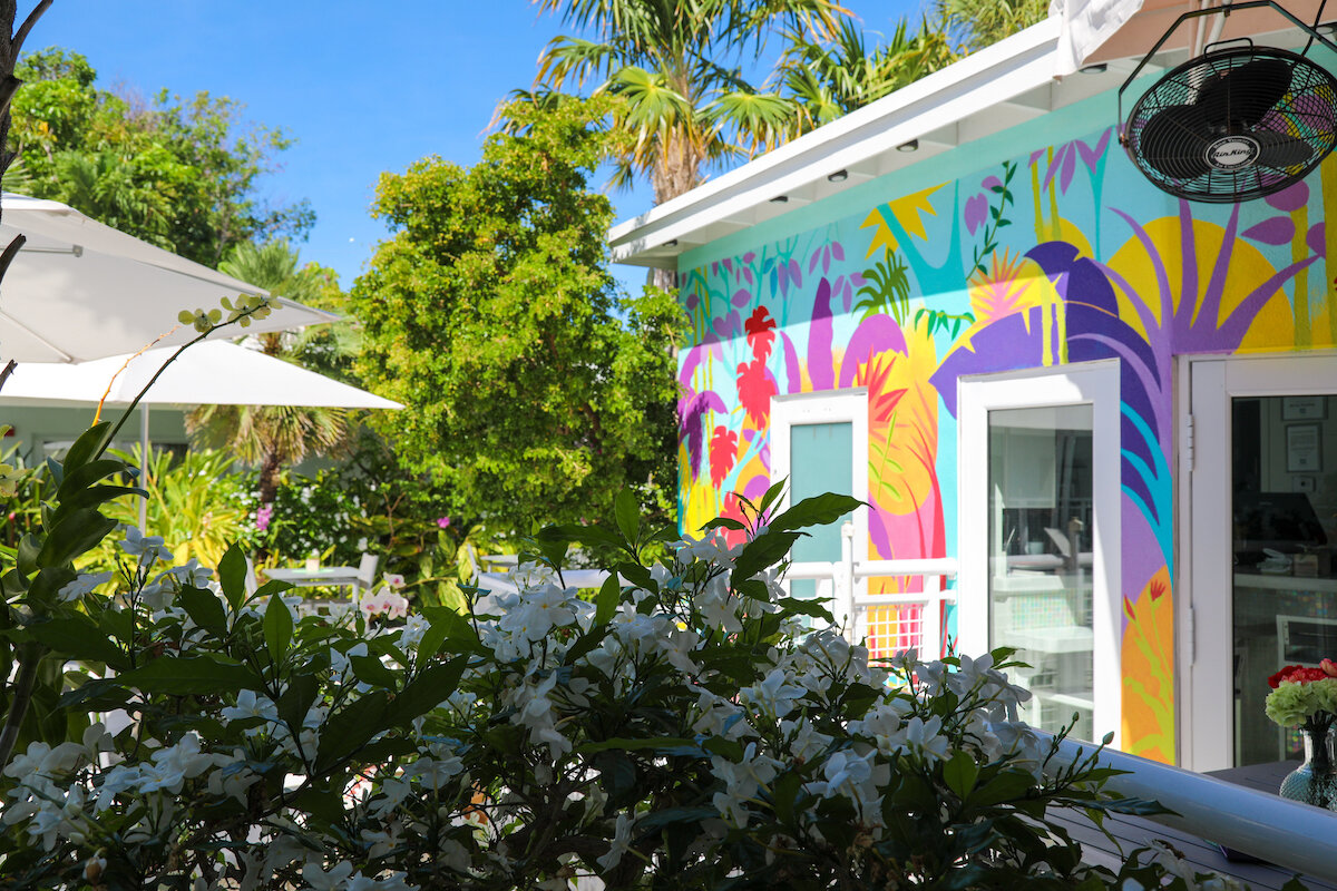 colorful murals exterior of orchid key inn