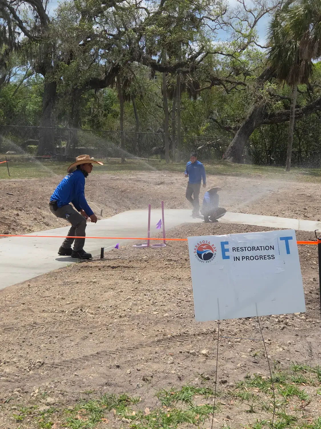 Installation crew testing zones on a new Sarasota irrigation system
