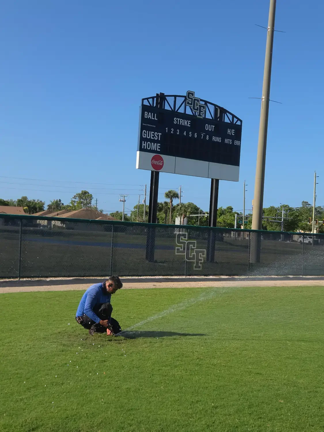 Commercial irrigation contractor keeping a sports turf field in play