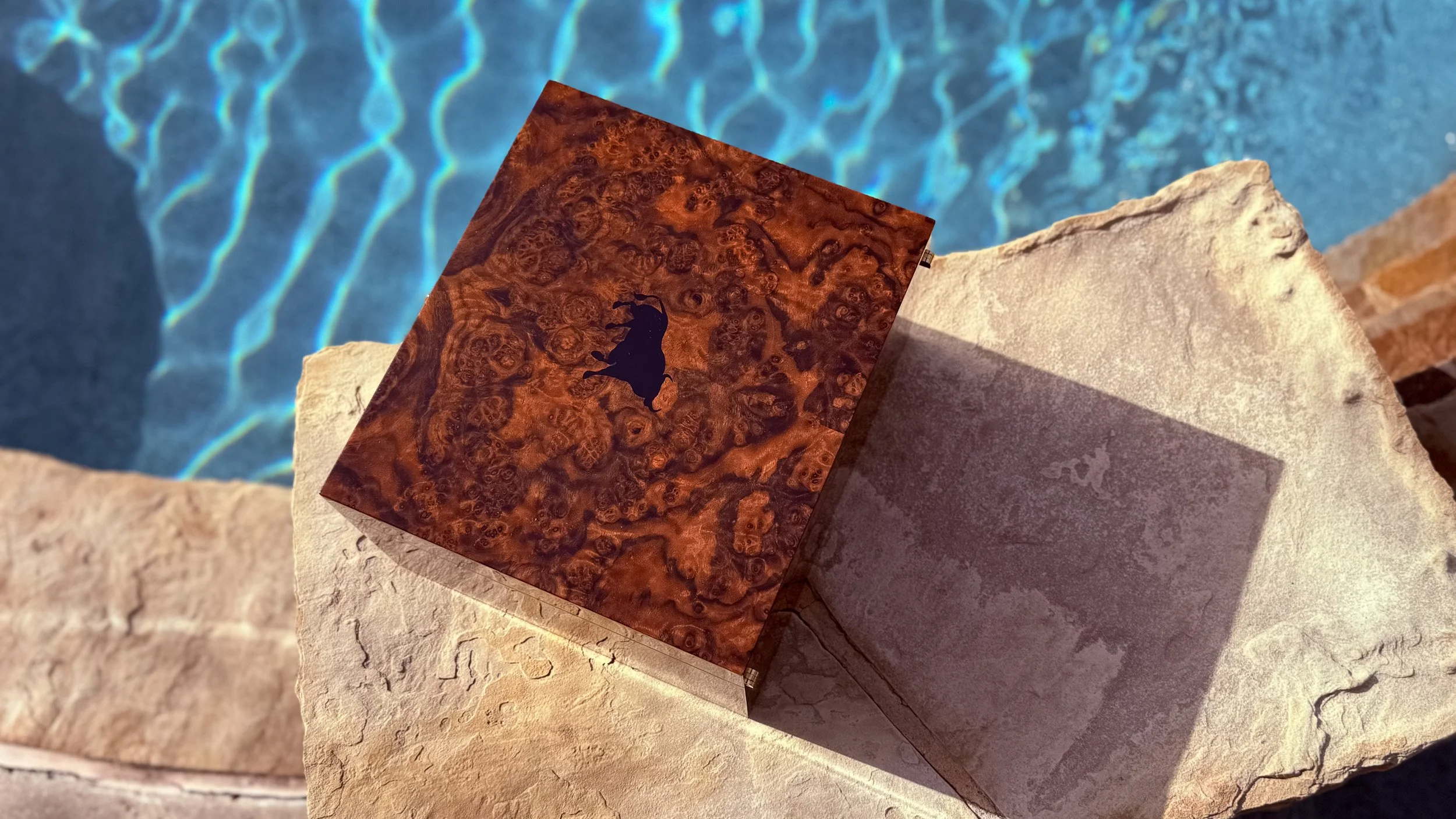 centient-luxury-walnut-burl-humidor-lid-bull-silhouette-top-view.jpg