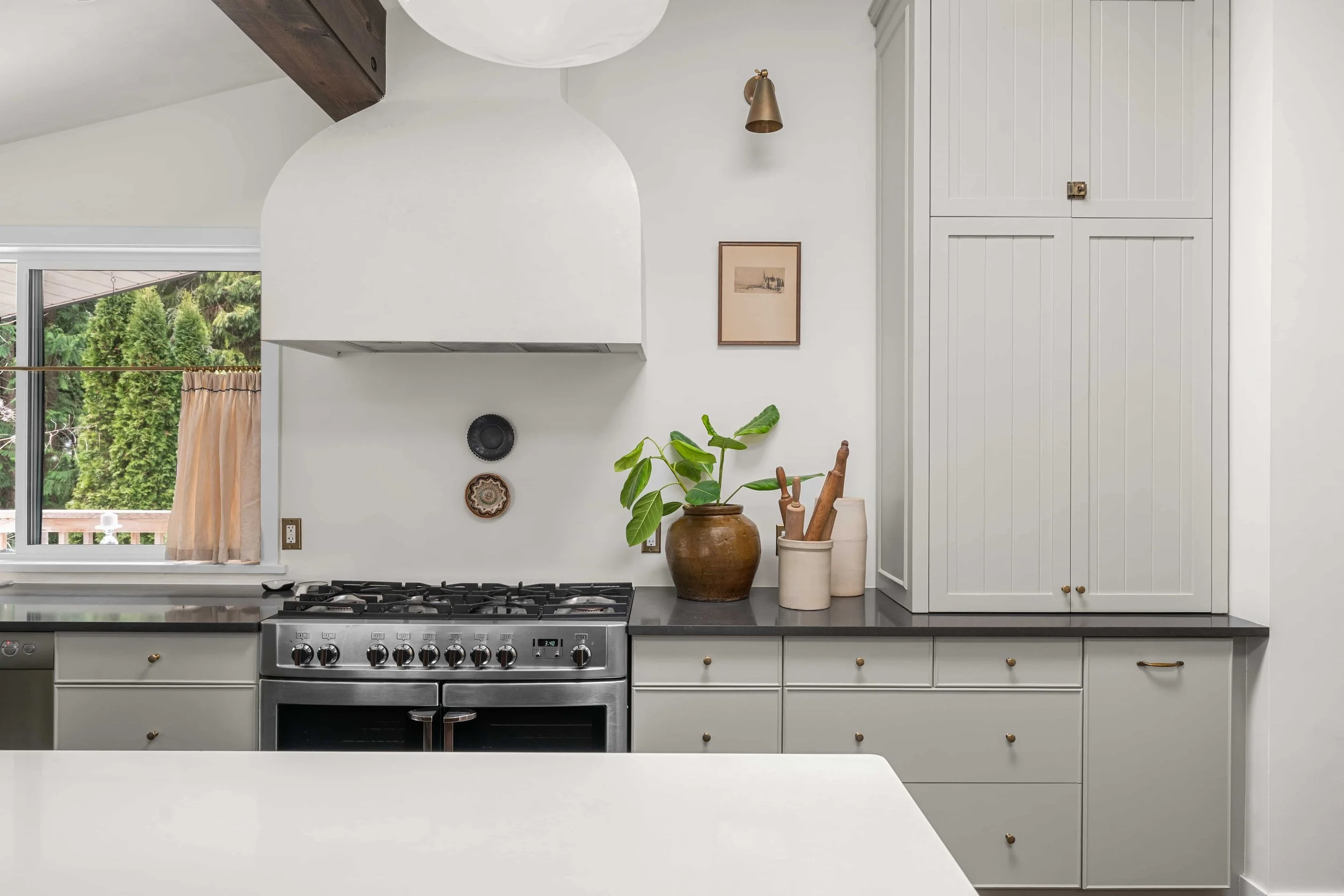 Interior design photography of luxury kitchen with marble island and custom cabinetry in North Vancouver