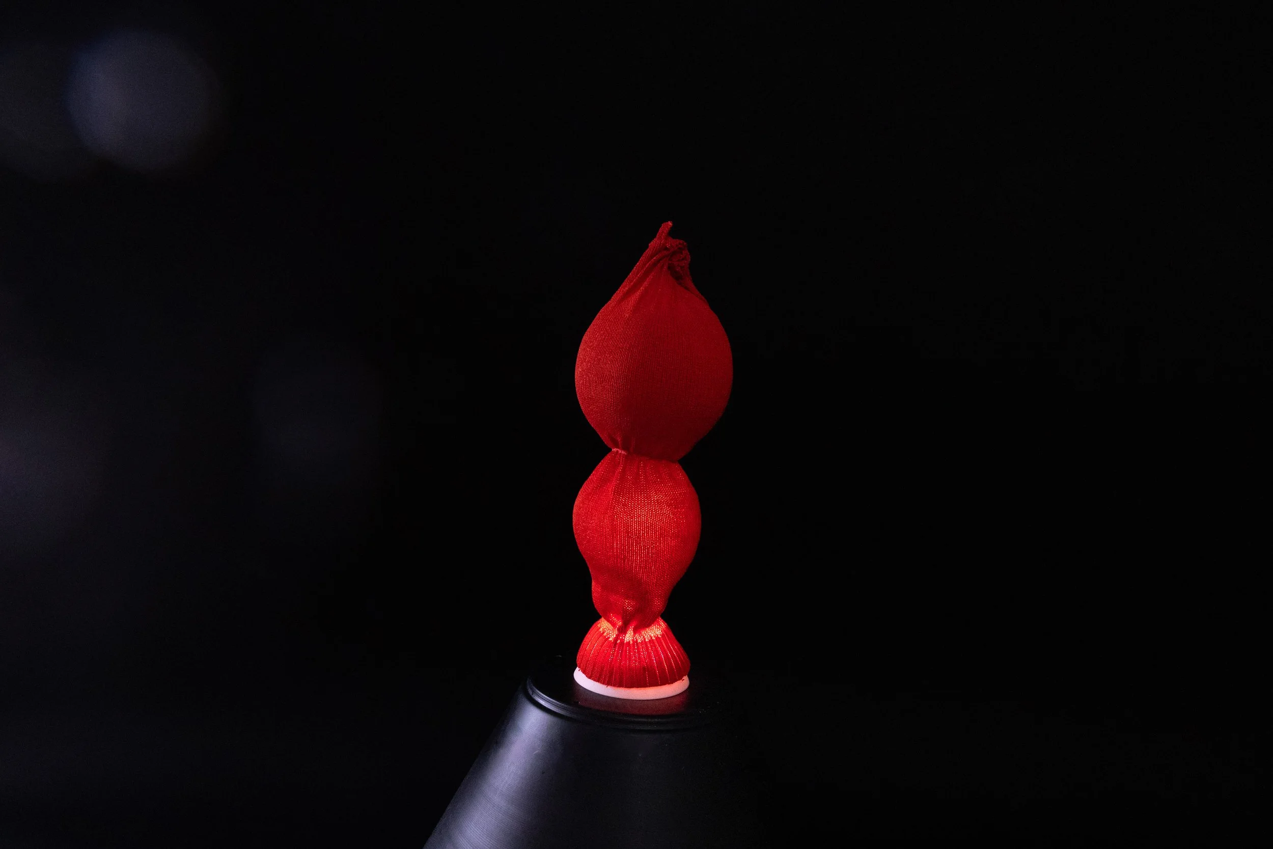 CaraHuato_OrangeTieBauble_2025_KnitBioplastic_ON_10.795x36cm_£375.jpg