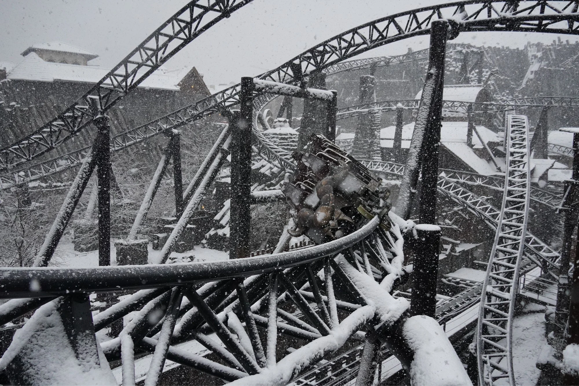 Taron in the snow Intamin Blitz Launch Roller Coaster at Wintertraum Phantasialand on a Coaster Breaks Winter Theme Park Tour