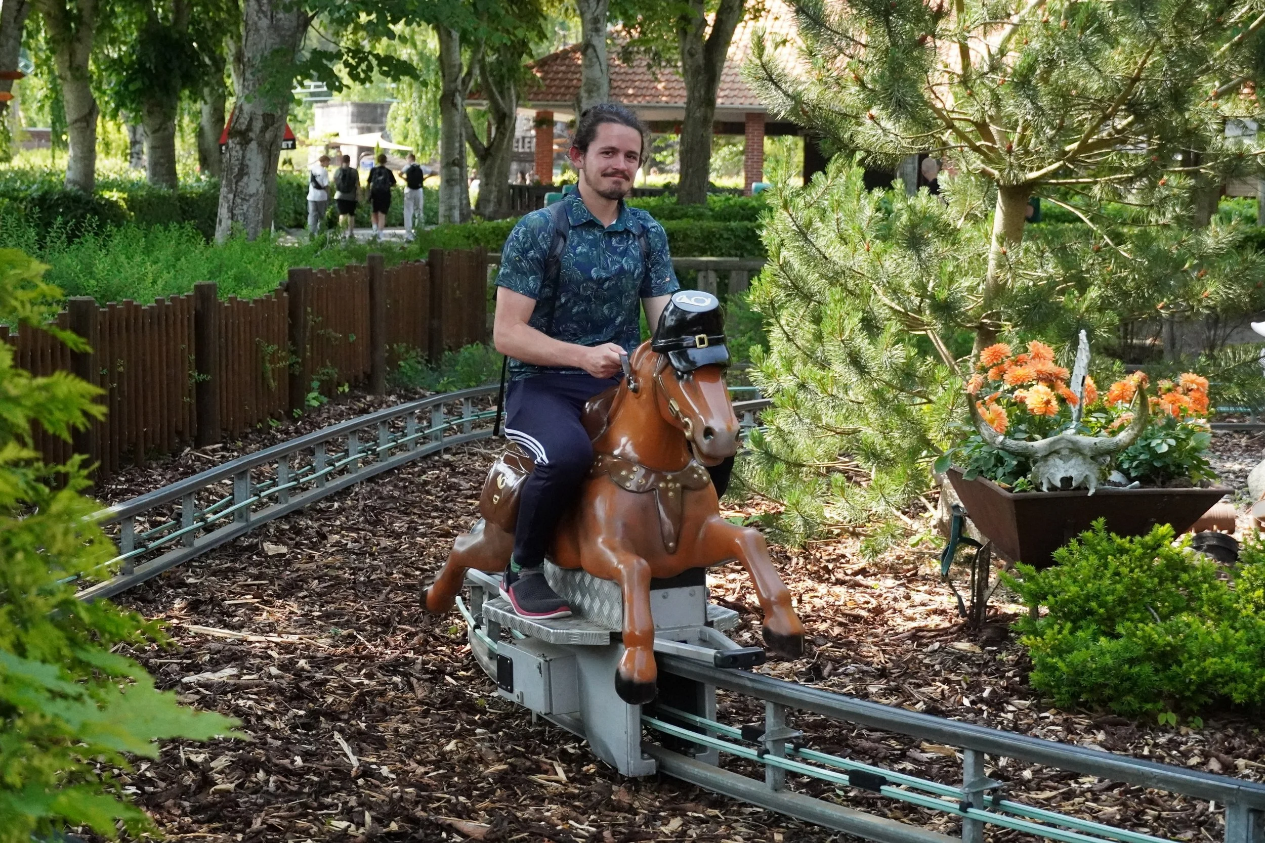 Guest enjoying Horse Kids Ride at Djurs Sommerland Theme Park in Denmark on a Coaster Breaks Scandinavian tour