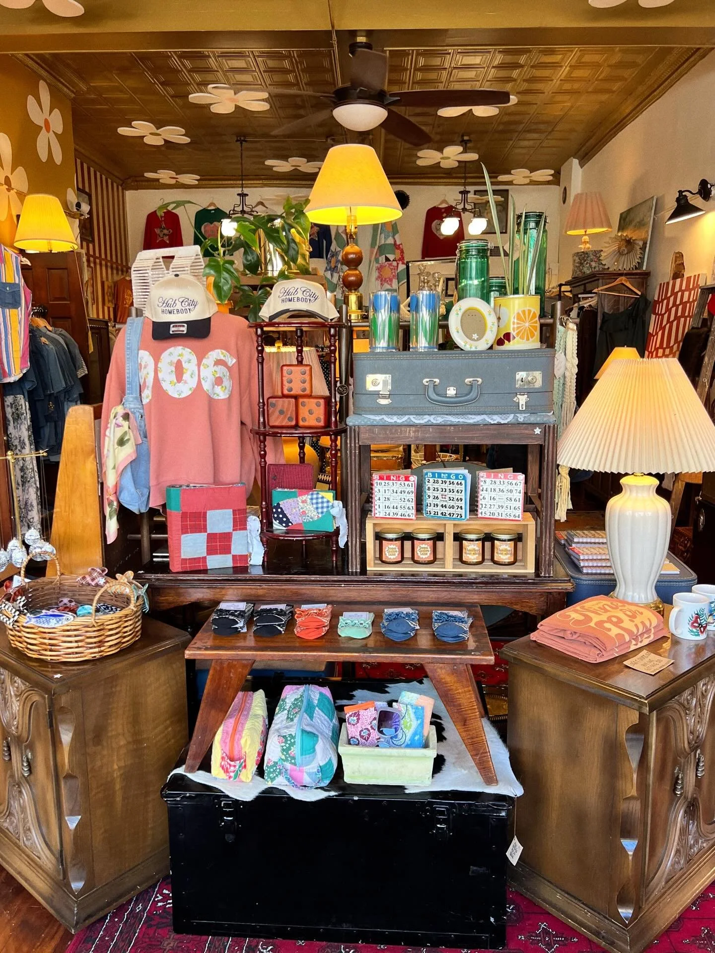 Gave the front display a spring refresh! ✨🌼💐💕Restocked on socks, hair clips, bingo notebooks, and @thehenswalkvintageshoppe dropped off more quilt scrunchies, cosmetic bags, and sunglass sleeves. 😎

Come see us today 11-6!