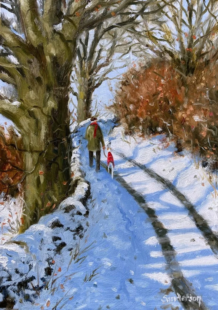 It's cold and still as we walk up the hill..