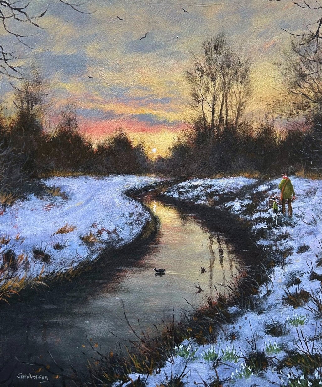 We watch the river flow from a bank lined with snow..